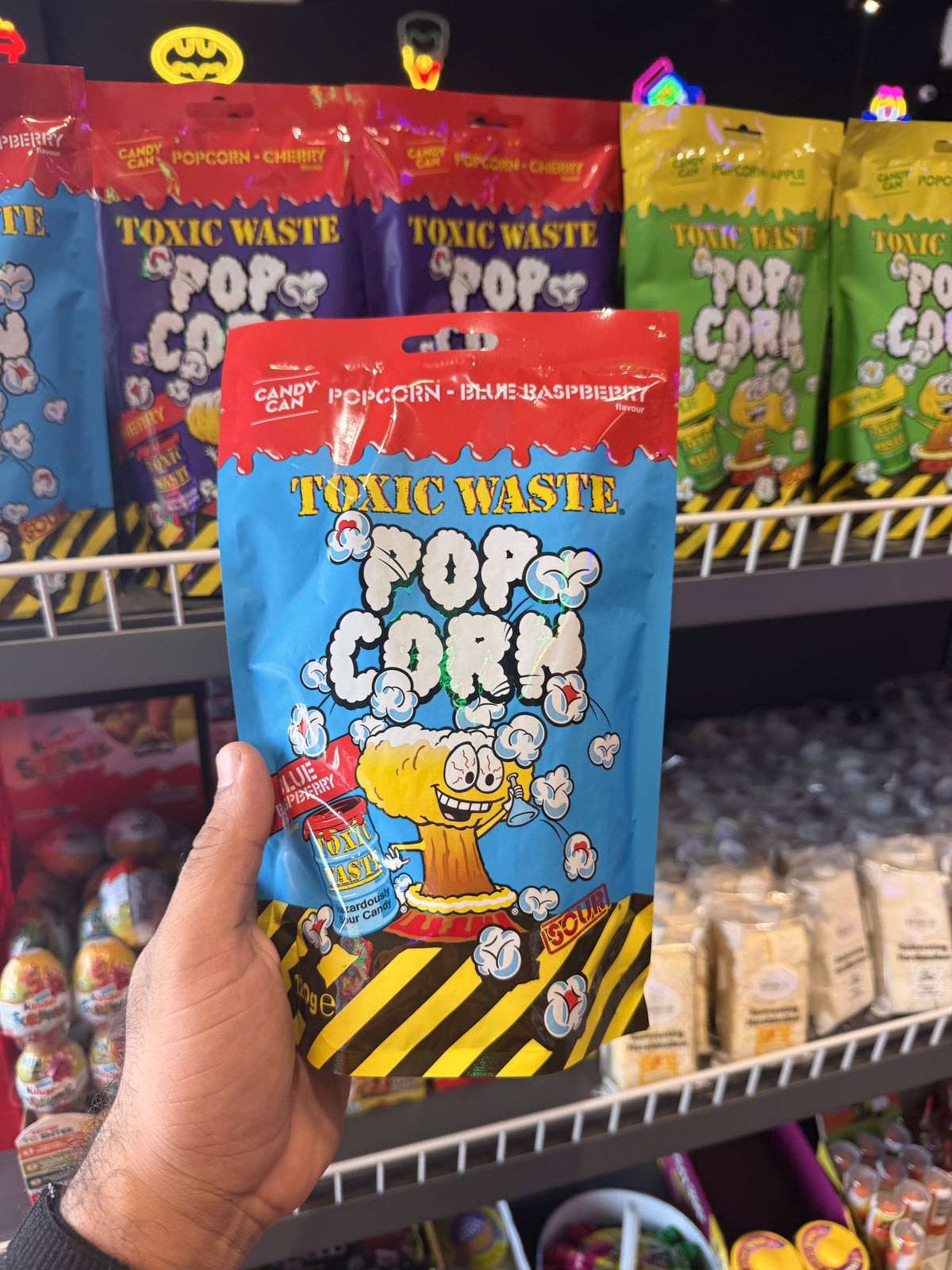 Candy can pop corn sour blue raspberry flavor toxic waste