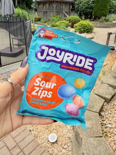 Joyride uncommon candy sour zips crunchy and chewy candy bites