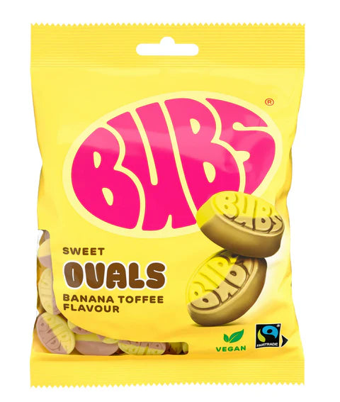 Bubs sweet banana toffee ovals foam candy 90g حلوى بوبس البيضاوية بنكهة الموز والتوفي، مصنوعة من الفوم، وزنها 90 غرامًا.